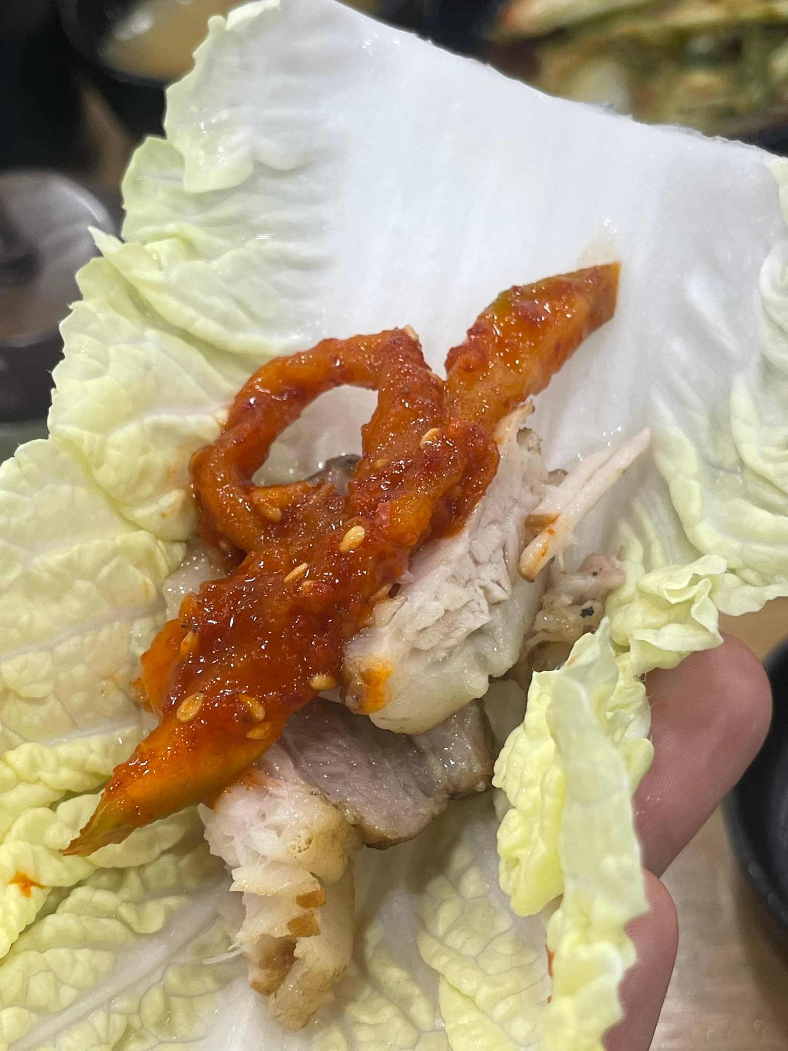 Gwanghwamun Mijin bossam with kimchi and napa cabbage wrap